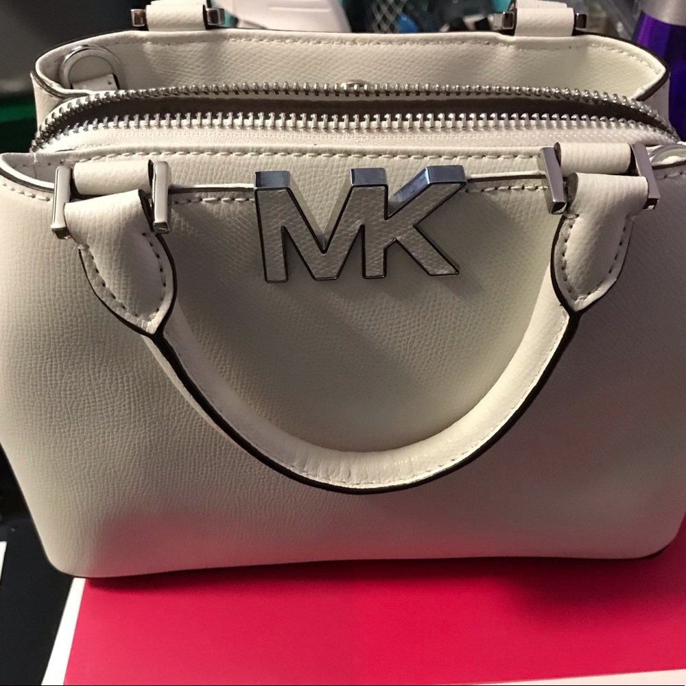 Michael Kors white purse.In Mint condition used 2x